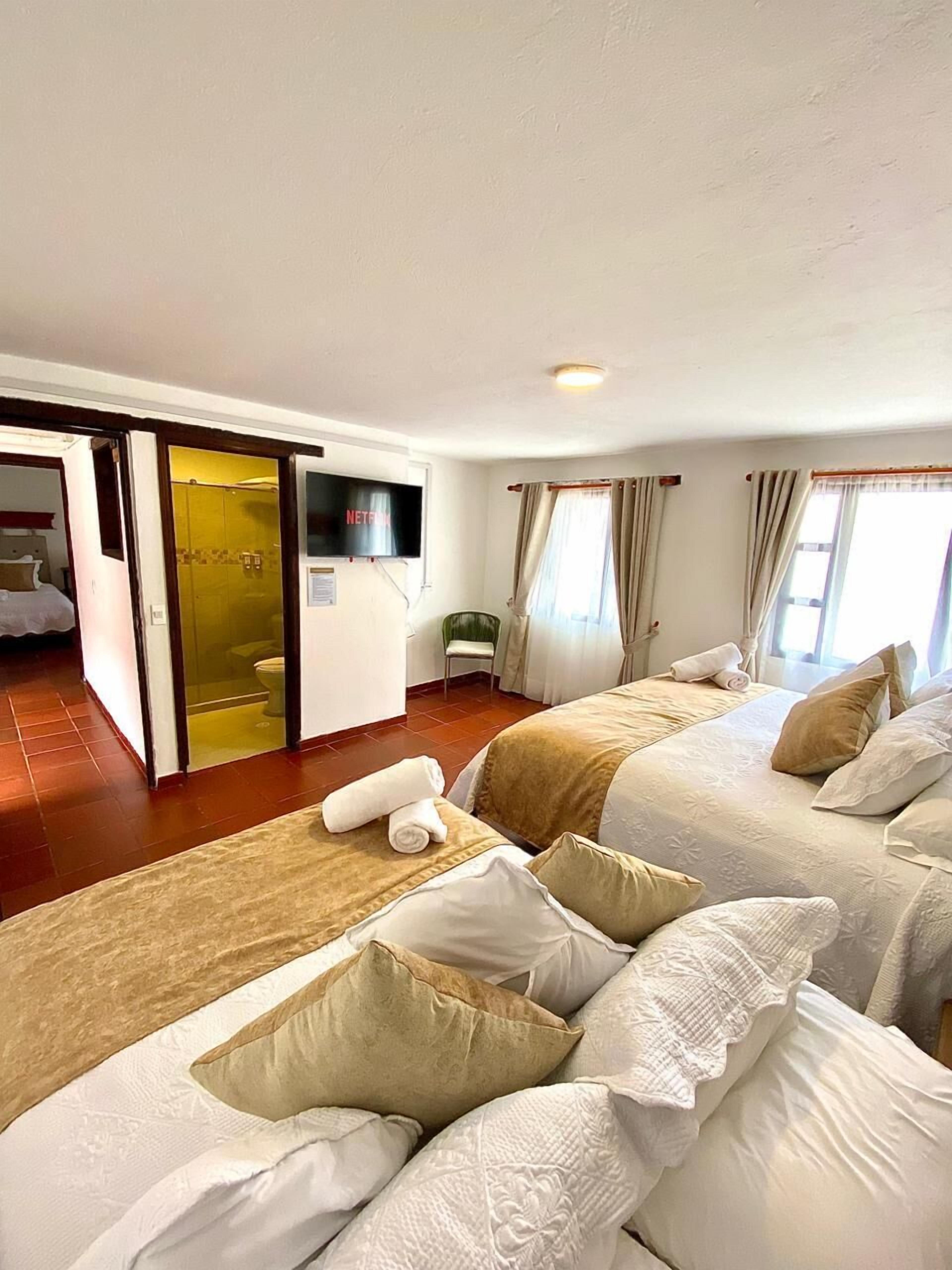 Standard Quadruple Room | Iron/ironing board, free WiFi