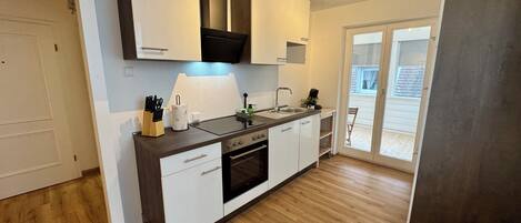 Réfrigérateur, four, plaque de cuisson, lave-vaisselle