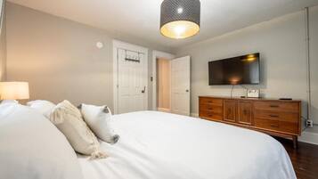 Premium bedding, blackout curtains, iron/ironing board, free WiFi