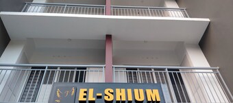 เอลชิอุม โฮมส์  