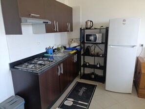 Coffee/tea maker, fridge, microwave, stovetop - Panoramic view | Cozy apartment M'diq (M'diq)