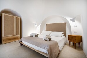 3 bedrooms, iron/ironing board, travel cot - Welcome to Villa Monti, where tradition meets contemporary elegance, nestled amidst the tranquility of the countryside and centuries-old olive trees. This finely restored property combines three authentic trulli, the iconic Apulian stone dwellings, with  (Cisternino)
