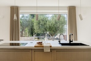 Fridge, microwave, dishwasher, toaster - Welcome to Villa Monti, where tradition meets contemporary elegance, nestled amidst the tranquility of the countryside and centuries-old olive trees. This finely restored property combines three authentic trulli, the iconic Apulian stone dwellings, with  (Cisternino)