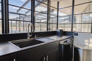 Fridge, microwave, oven, stovetop - Bunker House • Underground Bunker Speakeasy & Spa! (Joshua Tree)