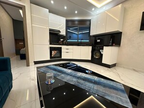 Penthouse, 1 Schlafzimmer, Balkon | Wohnbereich