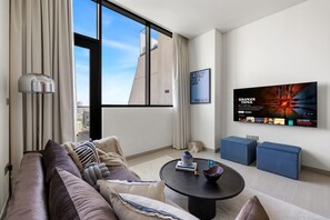 TV - Stylish 1BR with Private Pool Near Circle Mall (Dubai)