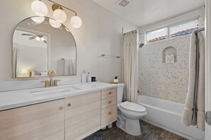 Hair dryer, towels, soap, toilet paper