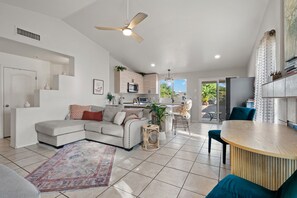 Smart TV, books - Cozy Art Retreat: Gourmet Kitchen + Workspace (Tucson)