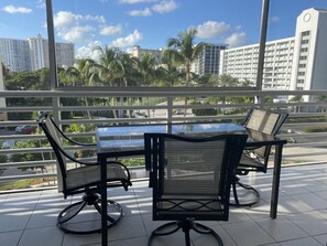 Outdoor dining - Close to the BEACH-Cozy 2 bedroom & 2 bath with private balconies & heated pool (Sunny Isles Beach)