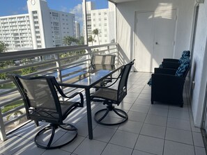 Outdoor dining - Close to the BEACH-Cozy 2 bedroom & 2 bath with private balconies & heated pool (Sunny Isles Beach)