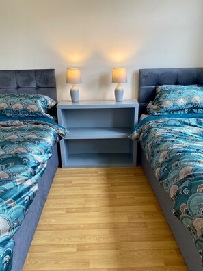 2 habitaciones, tabla de planchar con plancha y internet