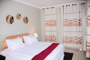 Deluxe Double Room | In-room safe, desk, laptop workspace, iron/ironing board - Konvine Boutique Hotel (Kigali)