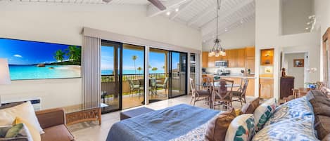 Luxury Apartment, Air conditioning, Ocean View | Living area | 50-inch Smart TV with cable channels