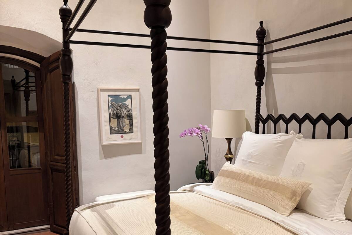 Deluxe Suite, City View | Minibar, in-room safe, soundproofing, free WiFi
