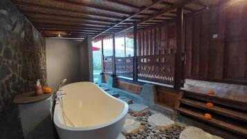 Deluxe Villa, Pool View | Deep soaking bathtub