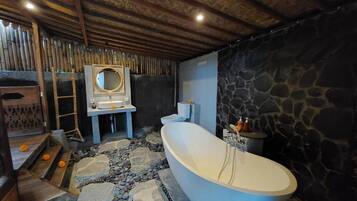 Deluxe Villa, Pool View | Bathroom | Separate tub and shower, bidet, towels, soap