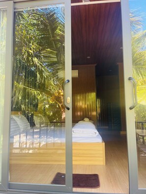 Family Room, Balcony, Garden View | Hypo-allergenic bedding, desk, laptop workspace, blackout drapes - Farm Tan Tien (Tuy Phong)