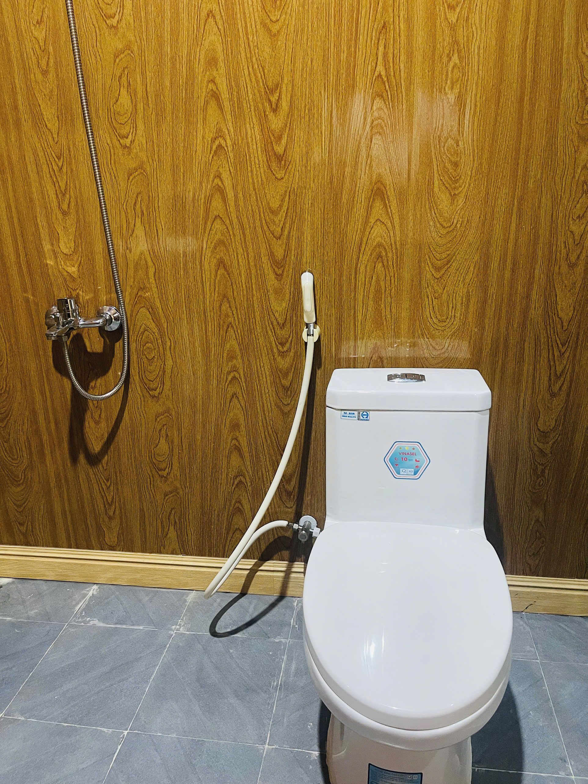 Shower, rainfall showerhead, eco-friendly toiletries, slippers