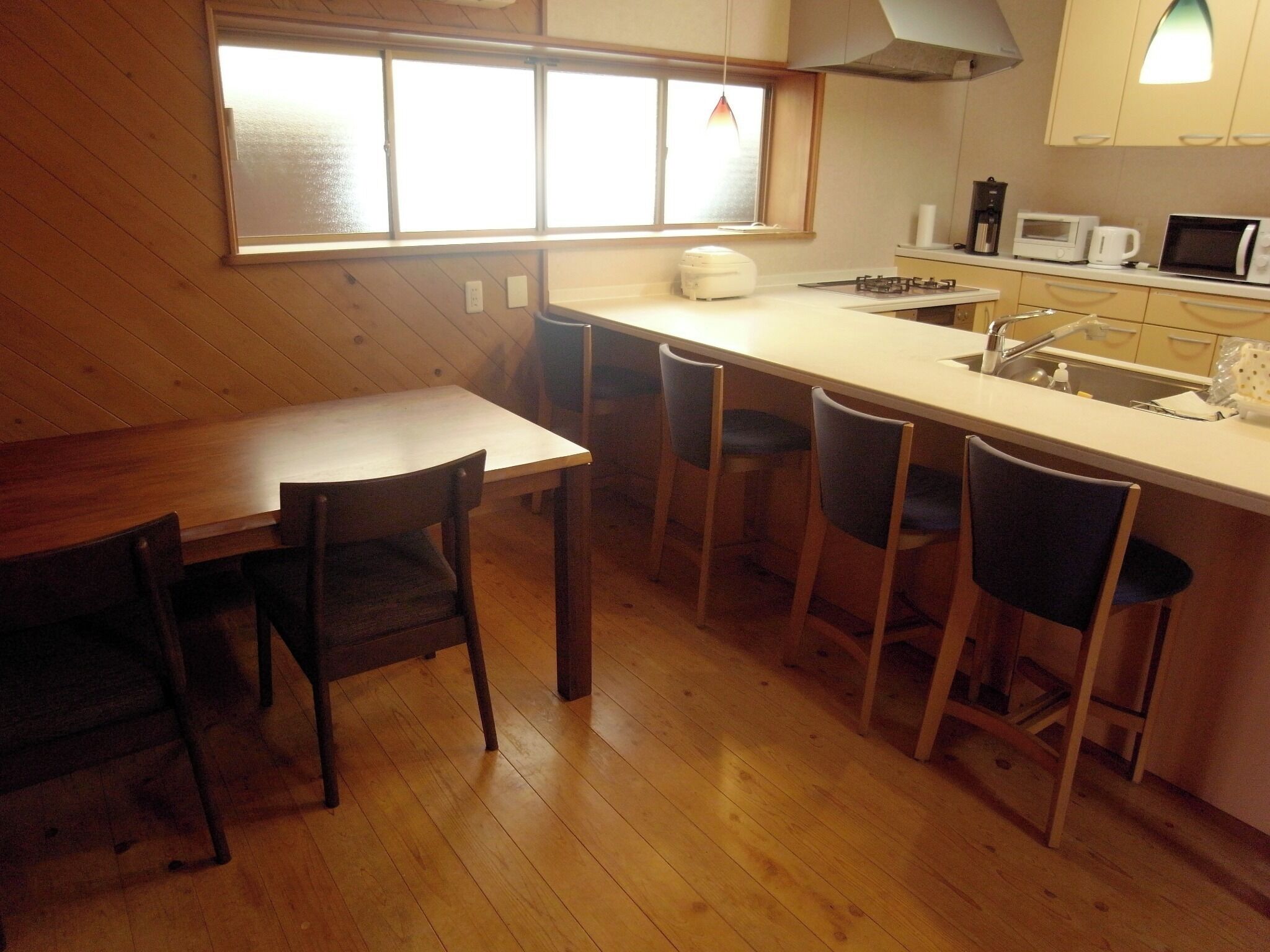 Fridge, microwave, stovetop, cookware/dishes/utensils