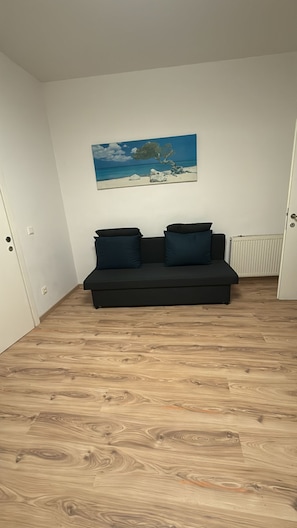 Eenvoudig appartement | Woonkamer