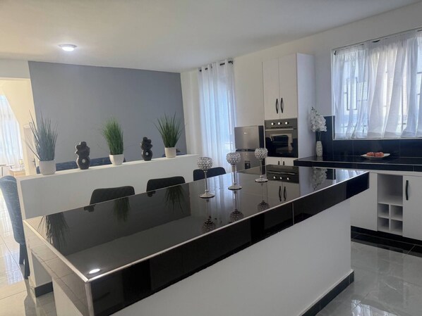 Microwave, toaster, cookware/dishes/utensils