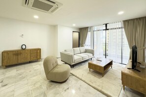 Family Condo, 3 Bedrooms, Balcony, City View | Living area - Villa Putra Condominium PWTC by Airhost (Kuala Lumpur)
