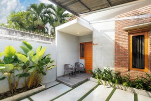 Quarto casal, varanda, vista para o jardim | Terraço/pátio