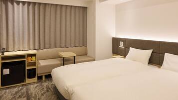 Twin Room | Down comforters, in-room safe, blackout drapes, free WiFi