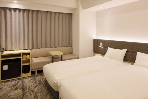 Twin Room | Down comforters, in-room safe, blackout drapes, free WiFi