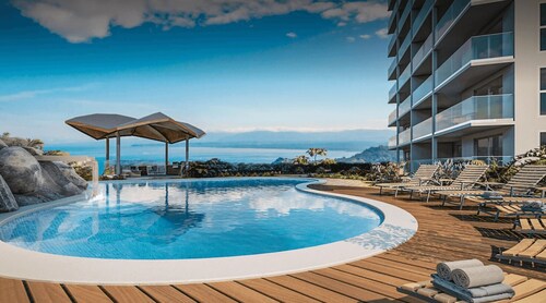 Ocean-view 3BR condo with resort pools, gym and coworking near Jacó.