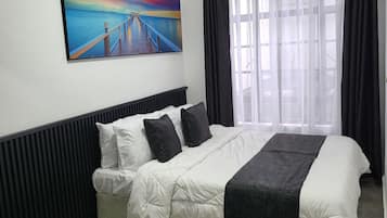 2 chambres, fer et planche Ă repasser, Wi-Fi gratuit, draps fournis