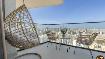 Luxury Apartment, Balcony, City View | Iron/ironing board, cribs/infant beds, free WiFi, bed sheets