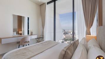 Luxe appartement, balkon, uitzicht op stad | Een strijkplank/strijkijzer, babybedden, gratis wifi, beddengoed