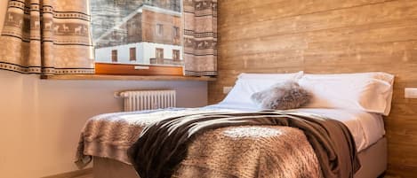 1 dormitorio, cuna de viaje, wifi gratis y ropa de cama