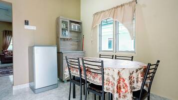 Minibar, desk, bed sheets
