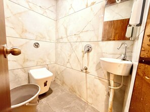 Shower, rainfall showerhead, free toiletries, bidet - Prime Located Hotel F T Palace  (Ujjain)