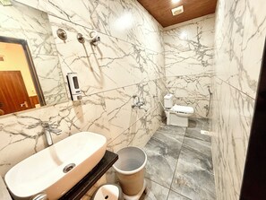 Shower, rainfall showerhead, free toiletries, bidet - Prime Located Hotel F T Palace  (Ujjain)