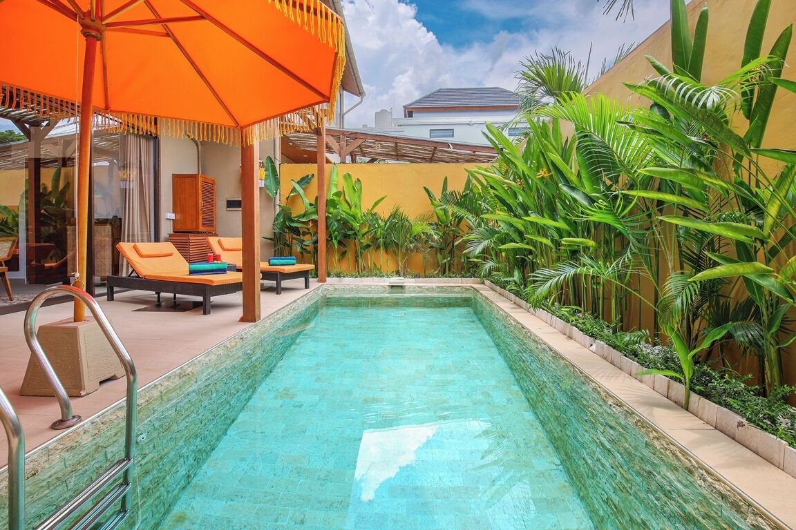 Outdoor pool, pool umbrellas, pool loungers