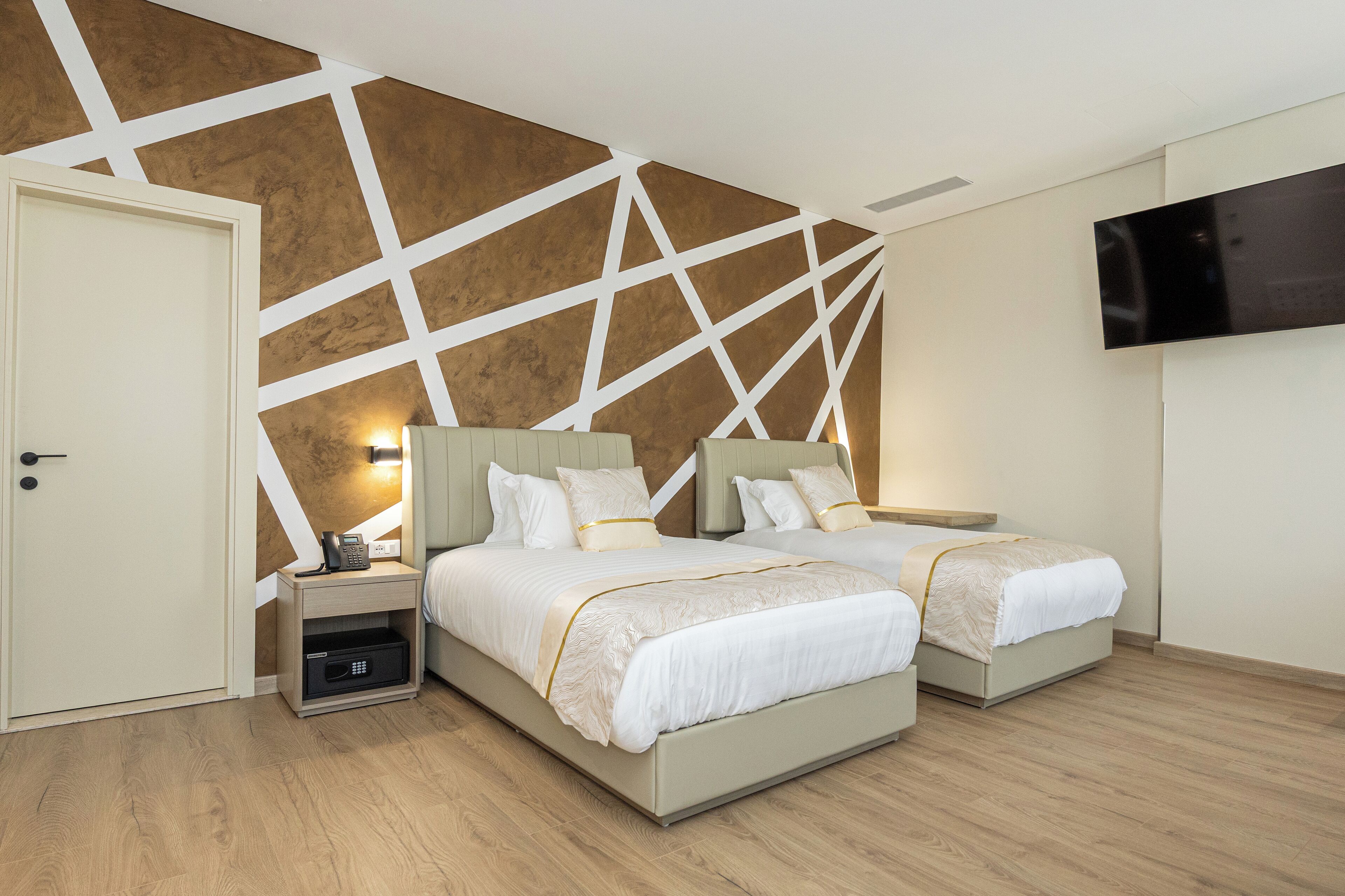 Deluxe Twin Room, City View | In-room safe, desk, iron/ironing board, free WiFi