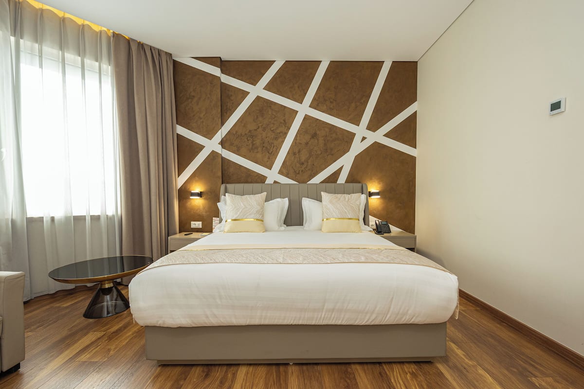 Deluxe Double Room, City View | In-room safe, desk, iron/ironing board, free WiFi