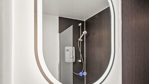 A bathroom with a shower, a control panel, and a mirror. - Ochil View 30 mins to Edinburgh (Falkirk)