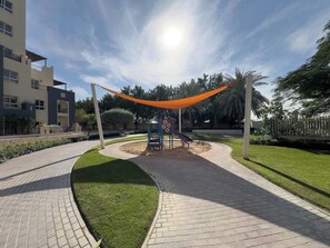 Children’s area - Free housekeeping visits during your stay - StayShort - 1 Bed in Dubai Land that Sleeps 2 with Balcony! (Dubai Land)