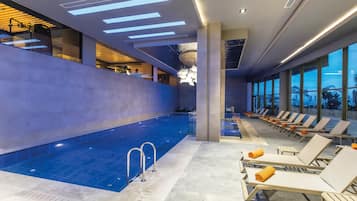 Indoor pool, 2 outdoor pools, open 8:00 AM to 7:00 PM, pool umbrellas