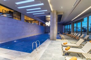 Indoor pool, 2 outdoor pools, open 8:00 AM to 7:00 PM, pool umbrellas