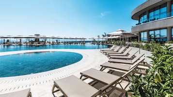 Indoor pool, 2 outdoor pools, open 8:00 AM to 7:00 PM, pool umbrellas