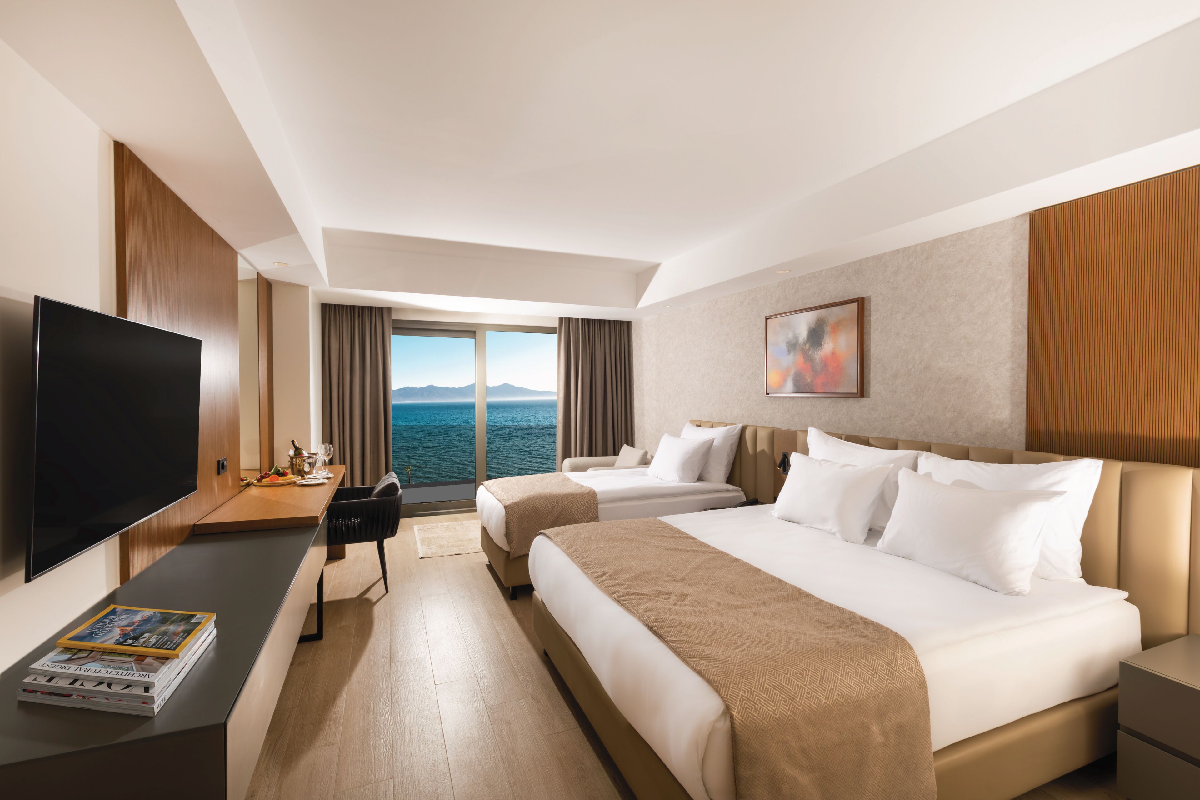 Habitación doble Deluxe, balcón, vista al mar | Ropa de cama de alta calidad y artículos del minibar gratis 