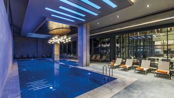 Indoor pool, 2 outdoor pools, open 8:00 AM to 7:00 PM, pool umbrellas