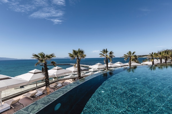 Indoor pool, 2 outdoor pools, open 8:00 AM to 7:00 PM, pool umbrellas
