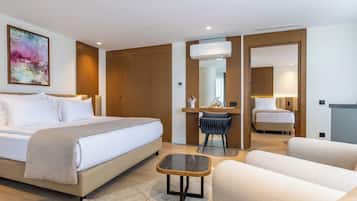 Family Room, Balcony | Premium bedding, free minibar, in-room safe, blackout drapes