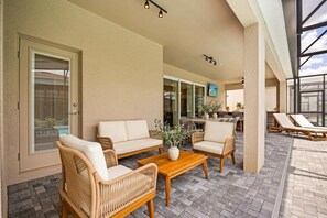 Terrace/patio - Last Minute Disney Getaway! Luxury Villa with Private Pool, Game Room & Themed Bedrooms. Book Now! #148491 (Orlando)
